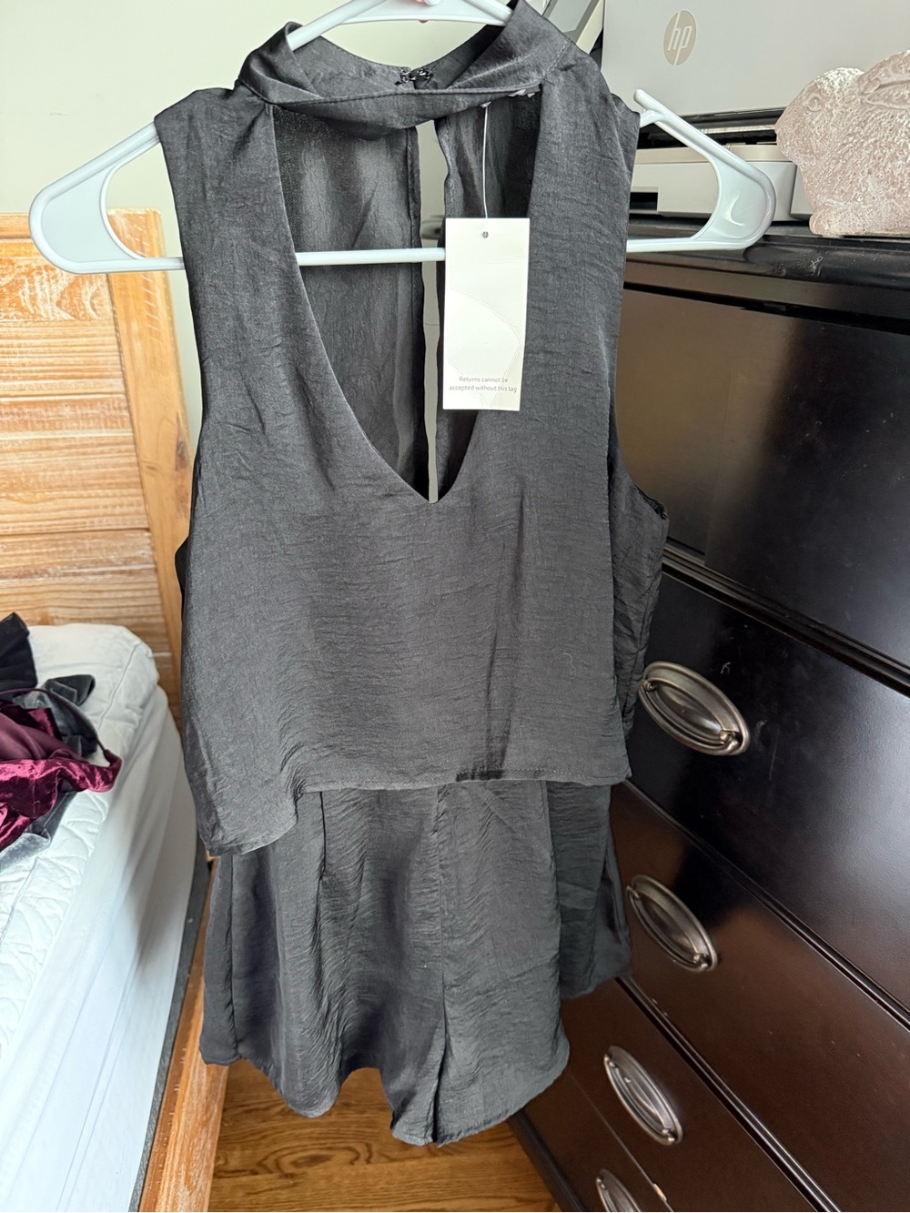 Tobi Black Sleeveless V-Neck Romper with Tie Back